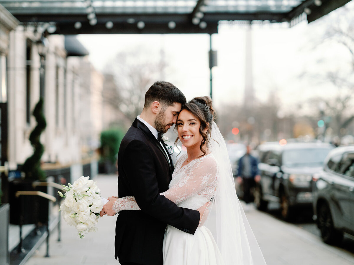 Portrait of couple outside Hotel Washington in Washington DC