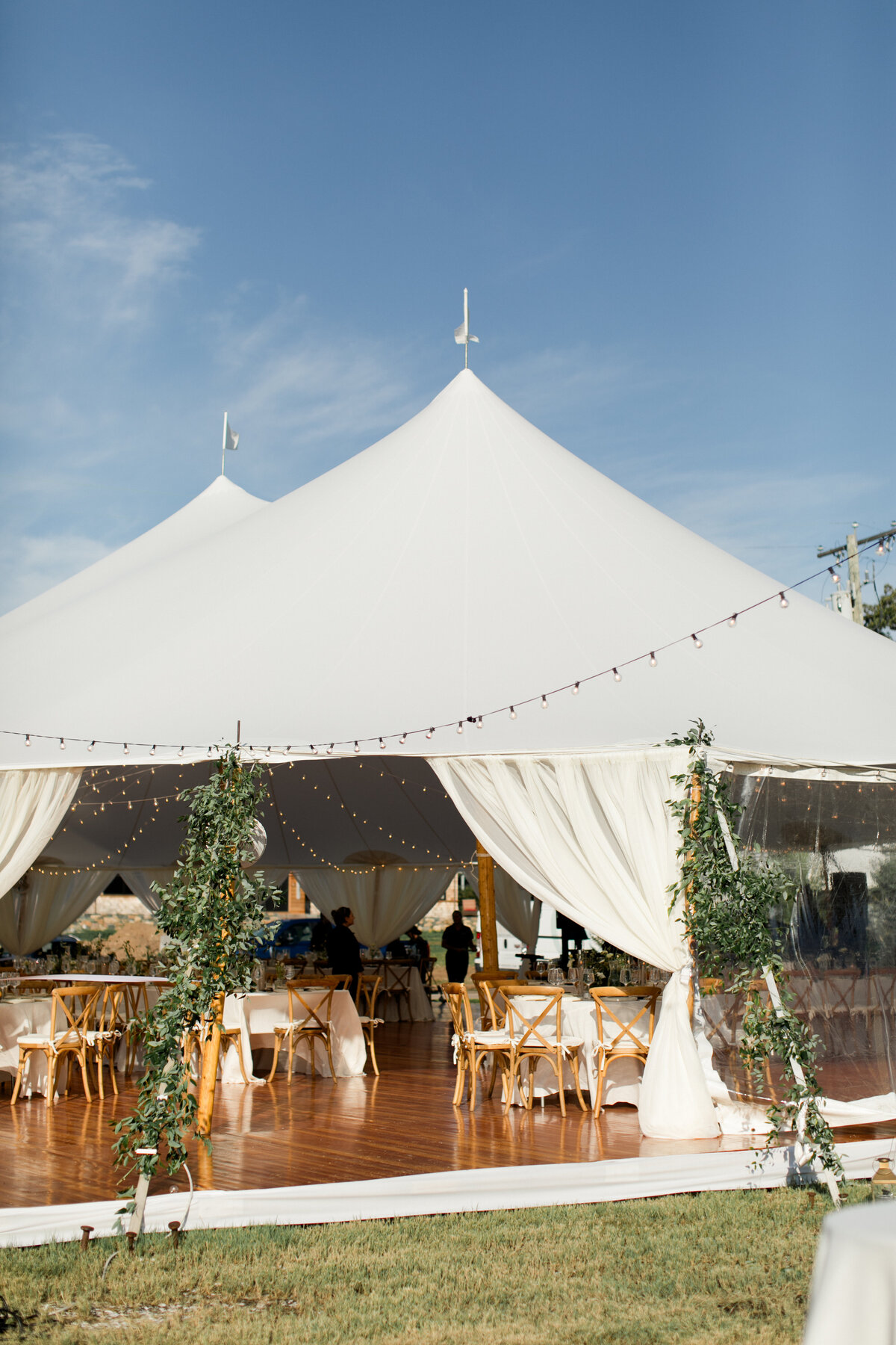 golden-hour-greenery-entrance-CT-sailcloth-tent-wedding