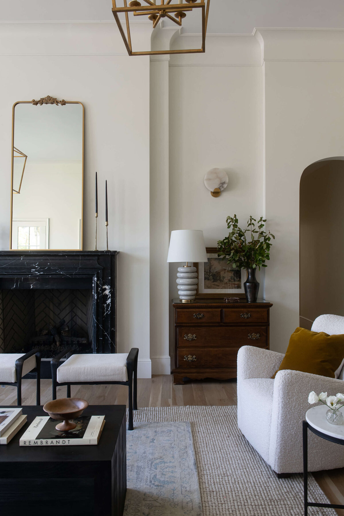 english-tudor-living-room-black-marble-fireplace-wilmington-interior-designer