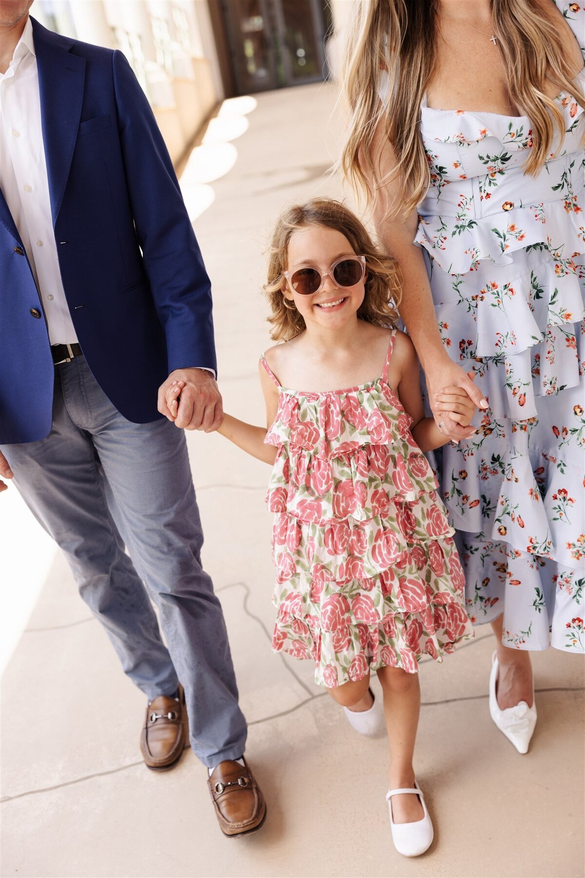 dallas family photo girl floral dress parents walking
