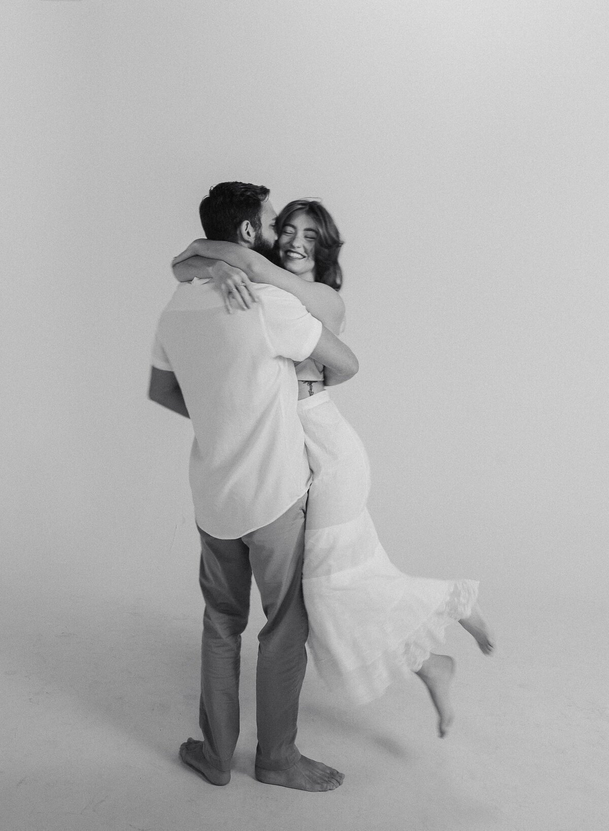 wedding film photography of bride and groom embracing, taken by Shelby Ann Photos