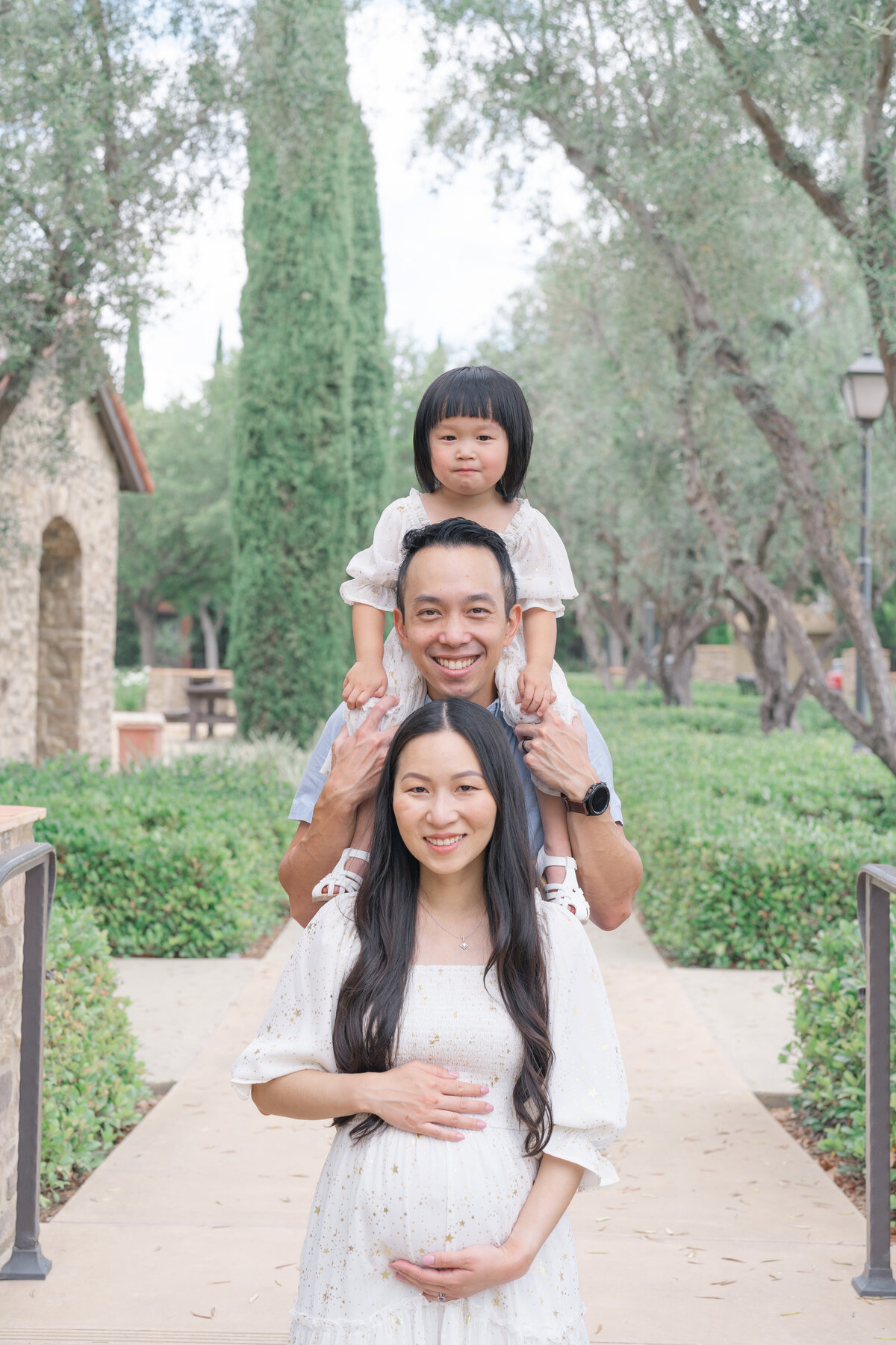 Family of three photoshoot at San Diego park.