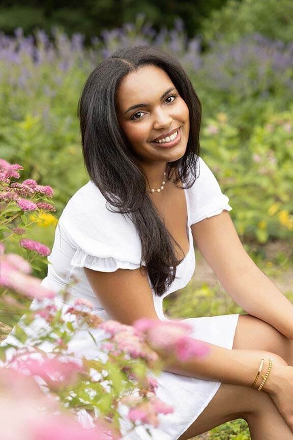 senior-girl-poses-in-garden