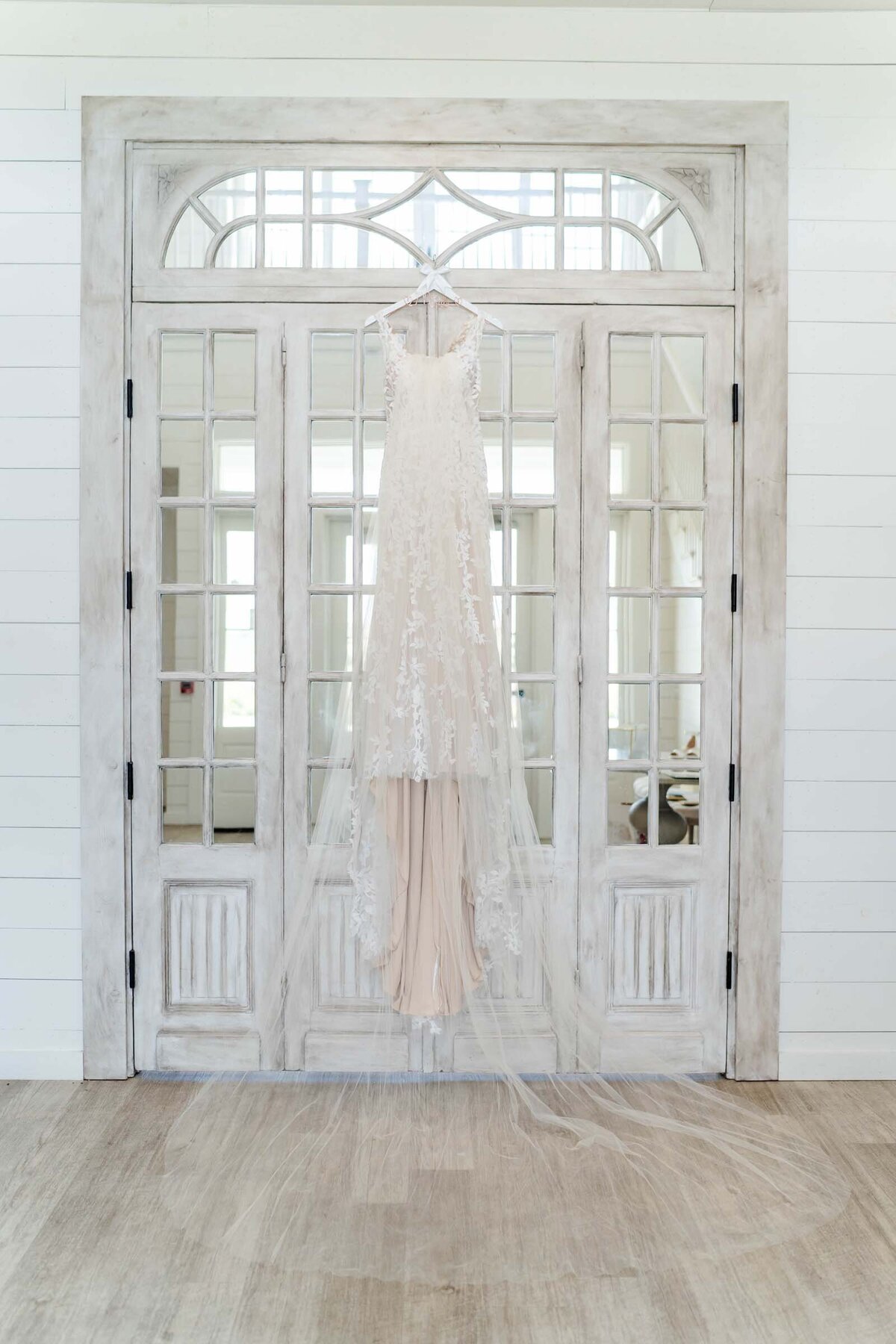 soft-pink-lace-bridal-gown-wedding-antique-doorway