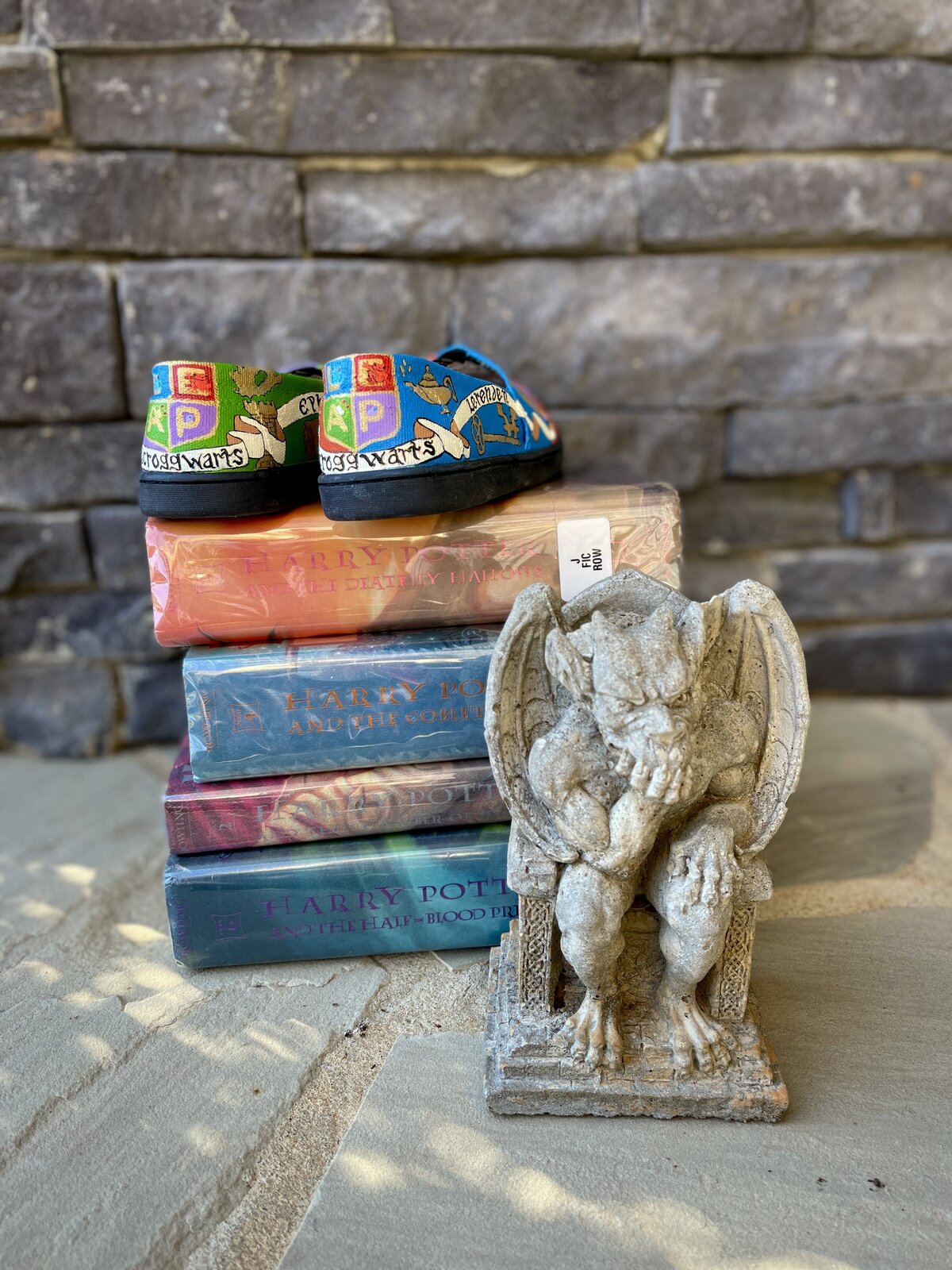 Toms custom painted for a giveaway at a local elementary school. The theme is LEAP and the school calls themselves Scroggwarts as a twist on Hoggwarts, using symbolic imagery and colors for each grade.