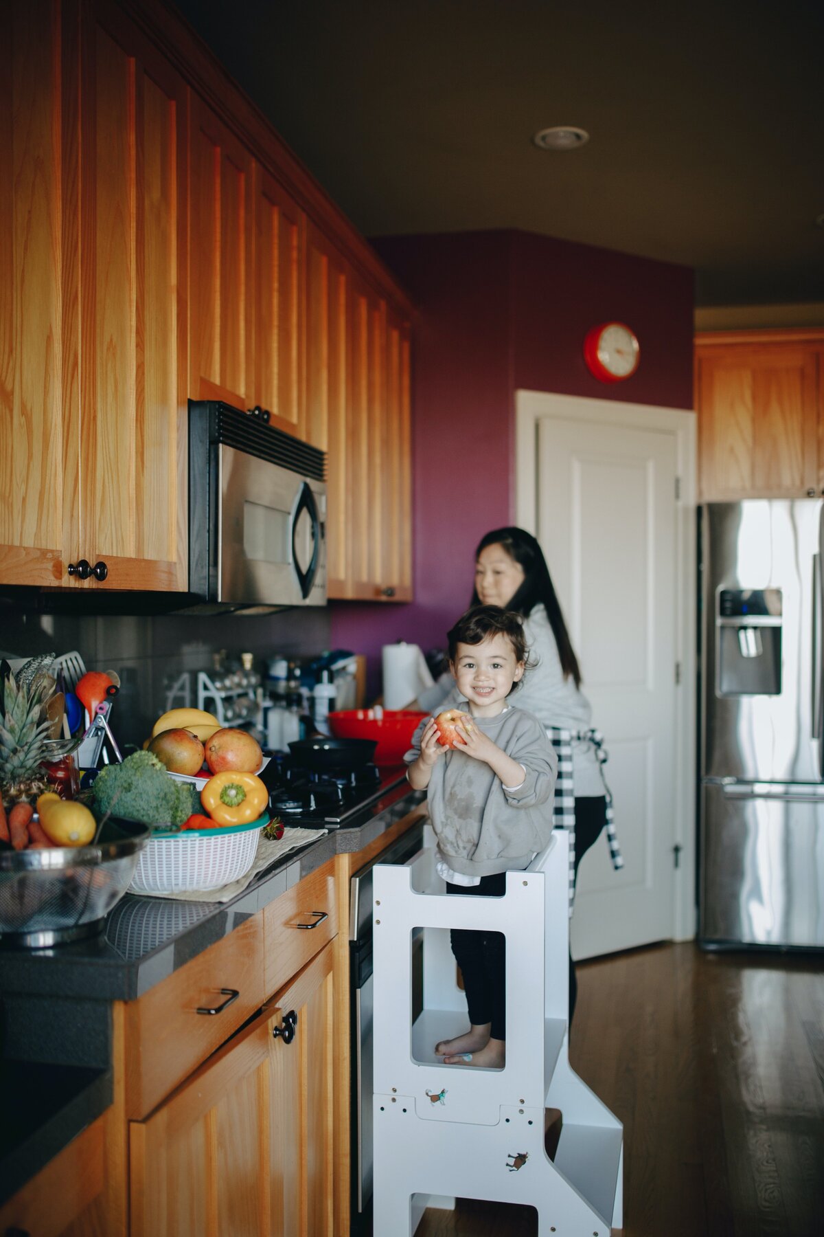 mom in kitchen with child