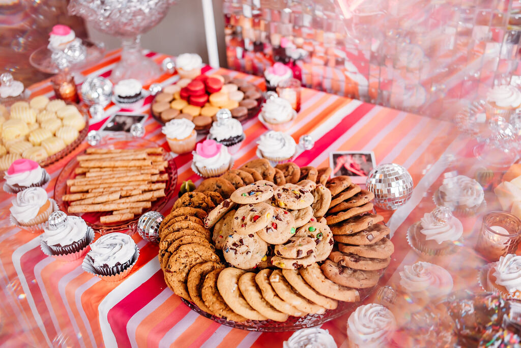 Vesper-and-Vow-Bemidji-Minnesota-wedding-and-elopement-photographer-coordinator-planner-pink-boho-disco-cookies-and-sweets-table