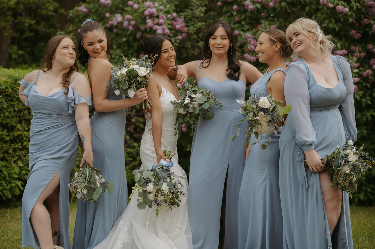 candid photo of bride with bridesmaids 