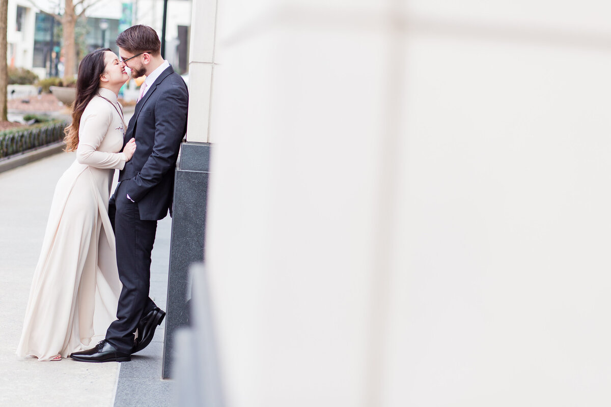 Couples kissing for engagement session photo