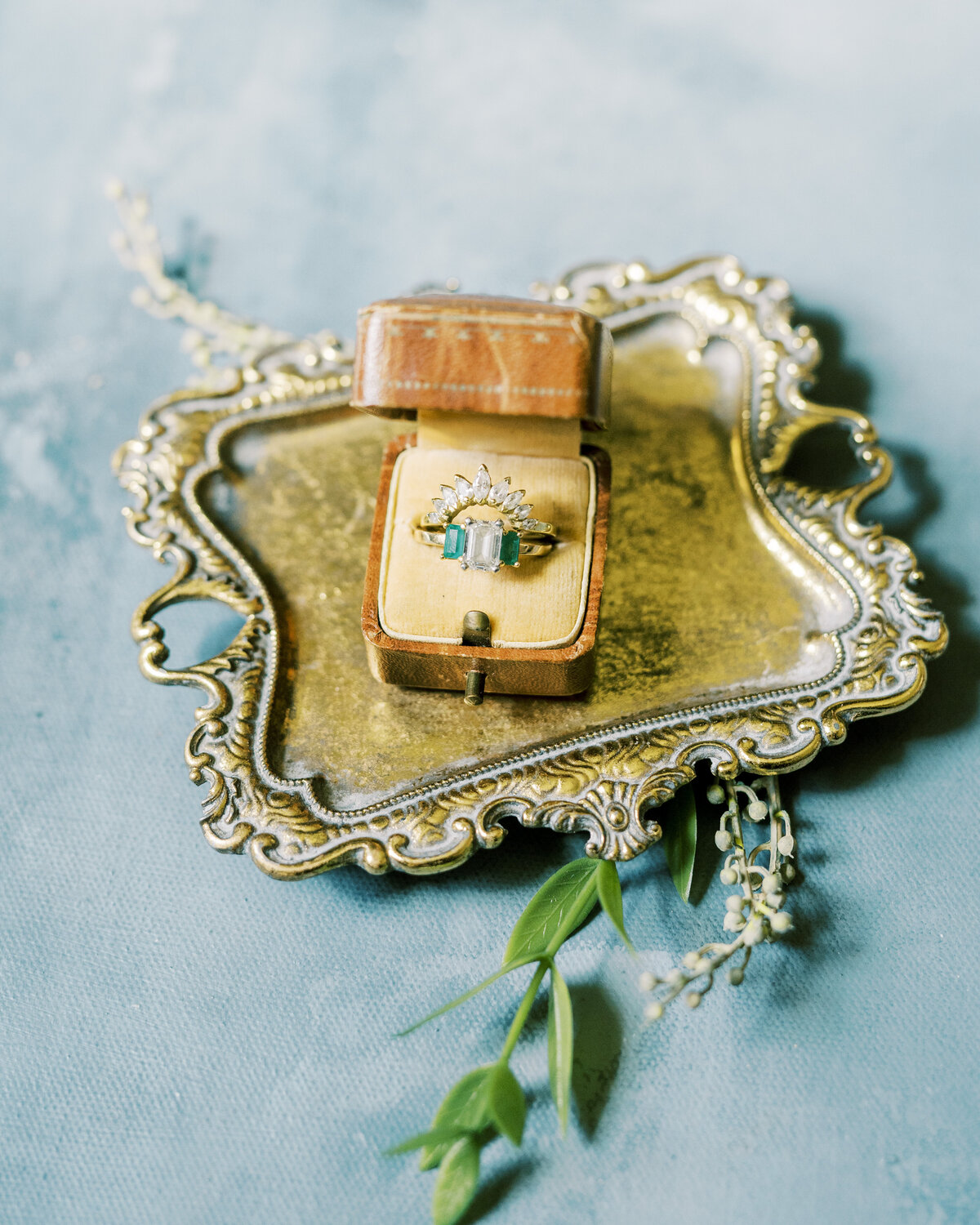 heirloom ring in vintage ring box on gold tray