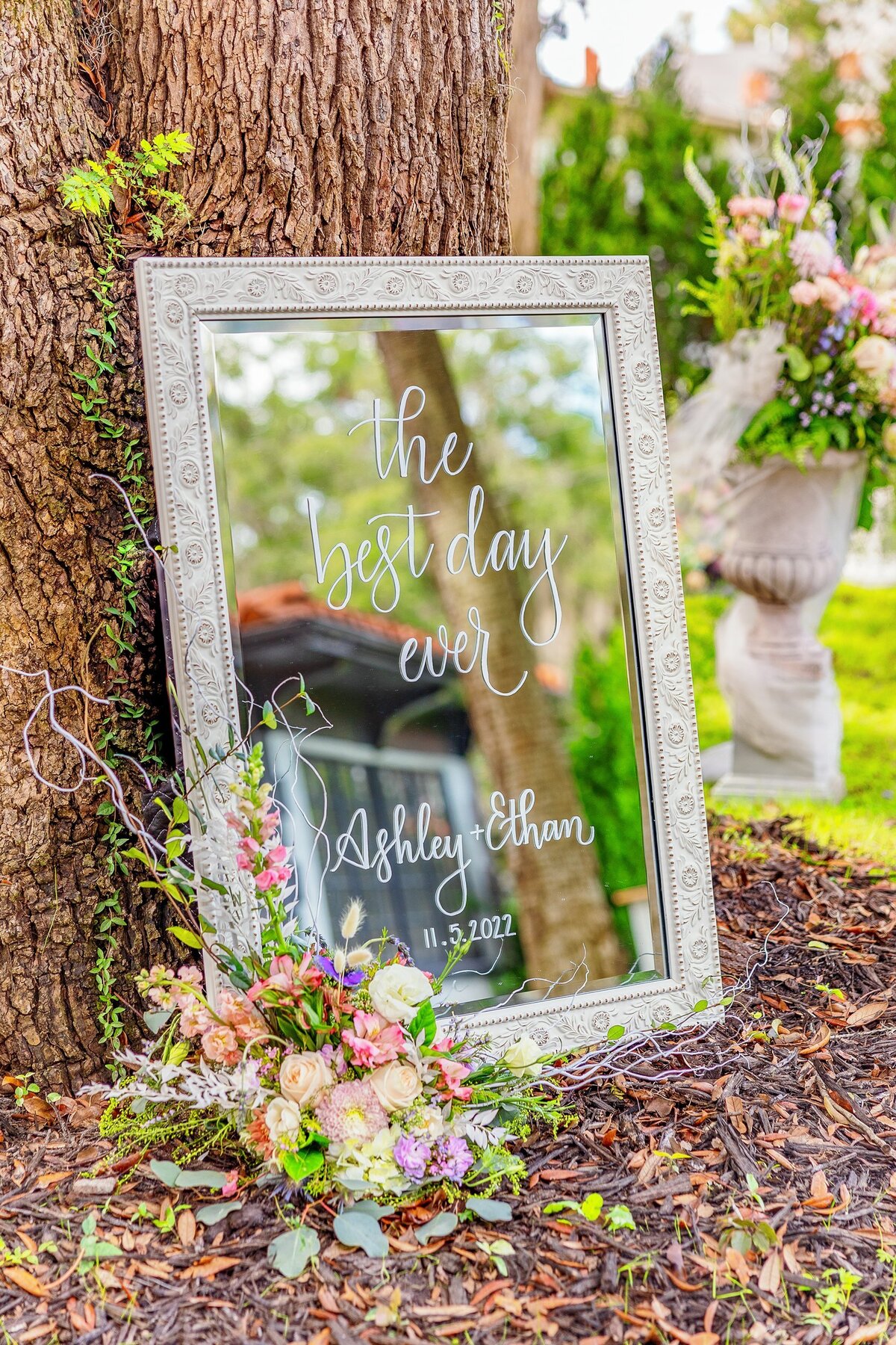 Large white vintage mirror with calligraphy for welcome sign