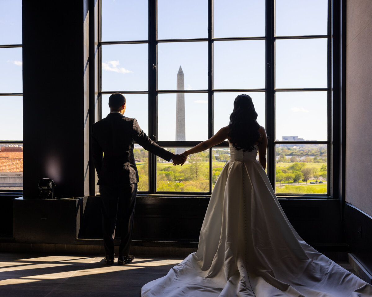 couple standing in window