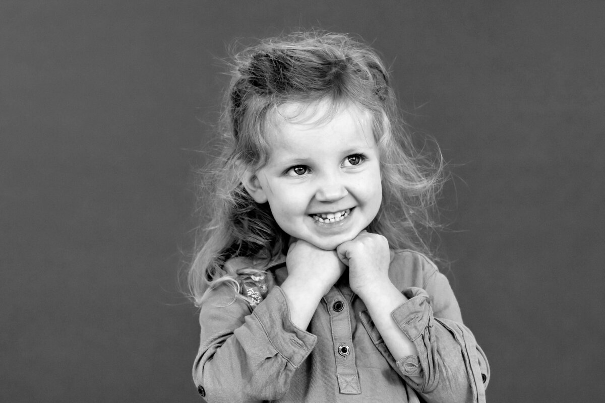 Fine art school portrait of a child in Coquitlam, with natural light and authentic expression
