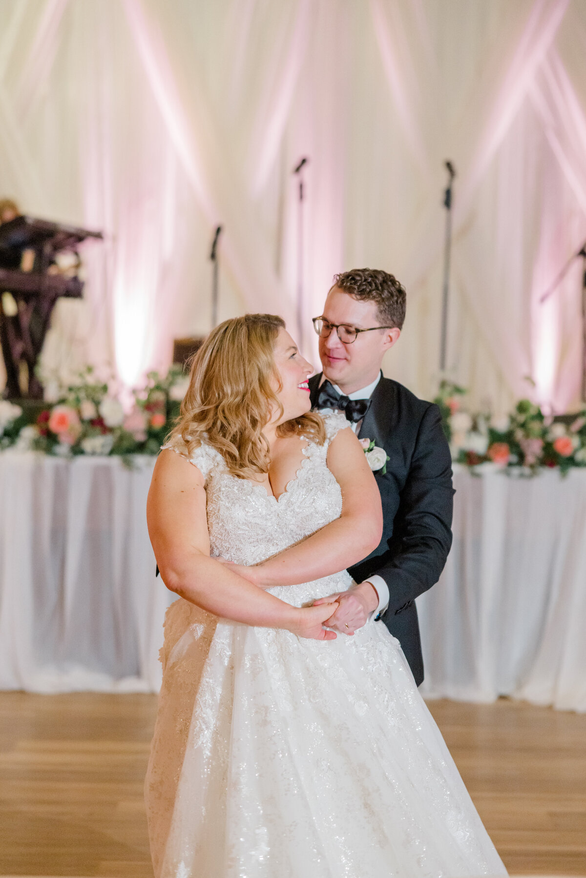 New-England-winter-wedding-charm-with-inviting-ambiance-uplighting-pops-of-pink