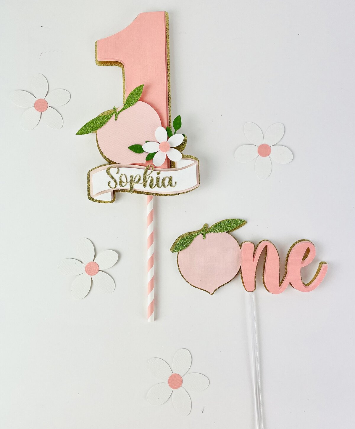 Peach colored cake toppers with Peach and One