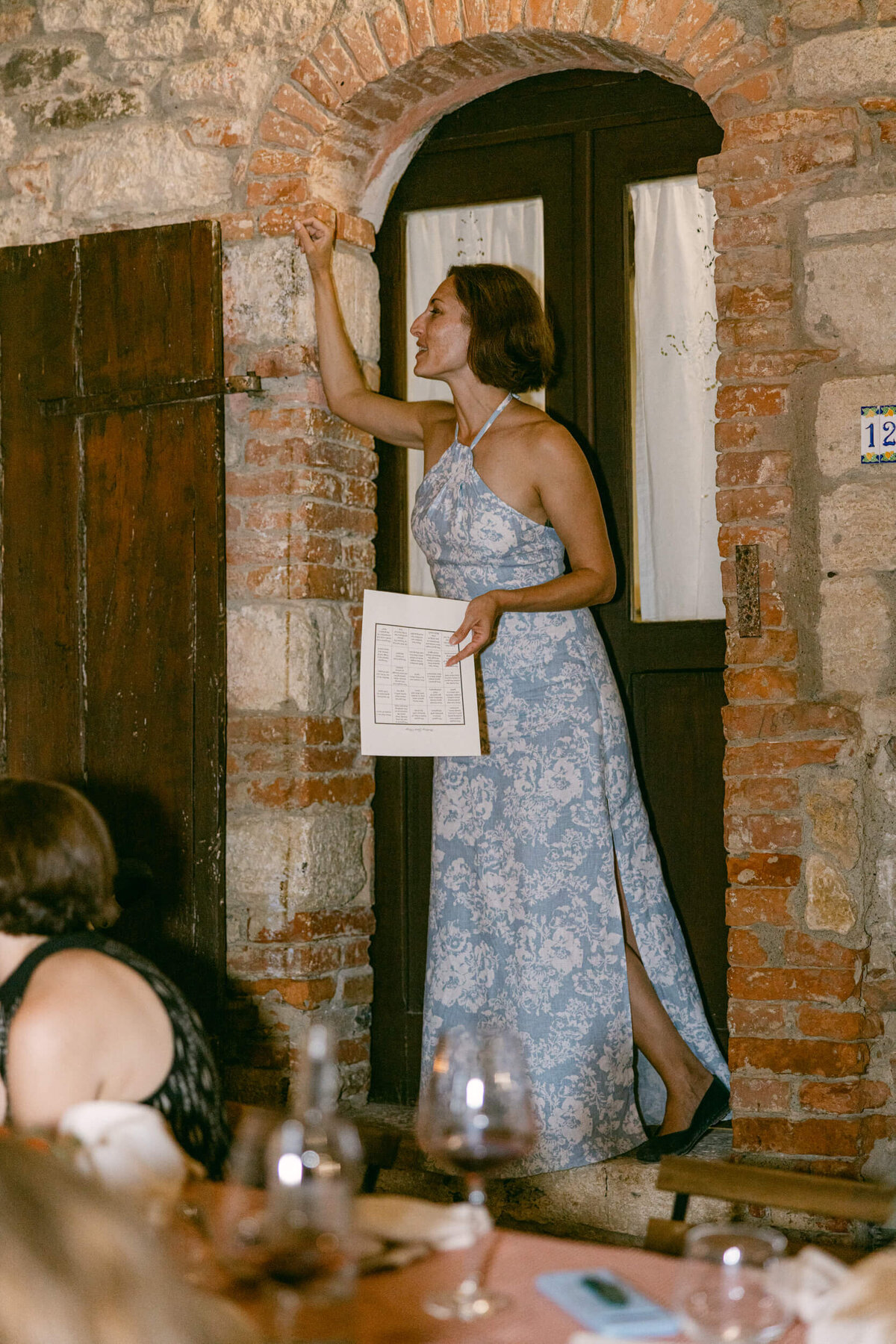 A wedding photo of the venue Laticastelli during cocktail hour in aTuscany Italy