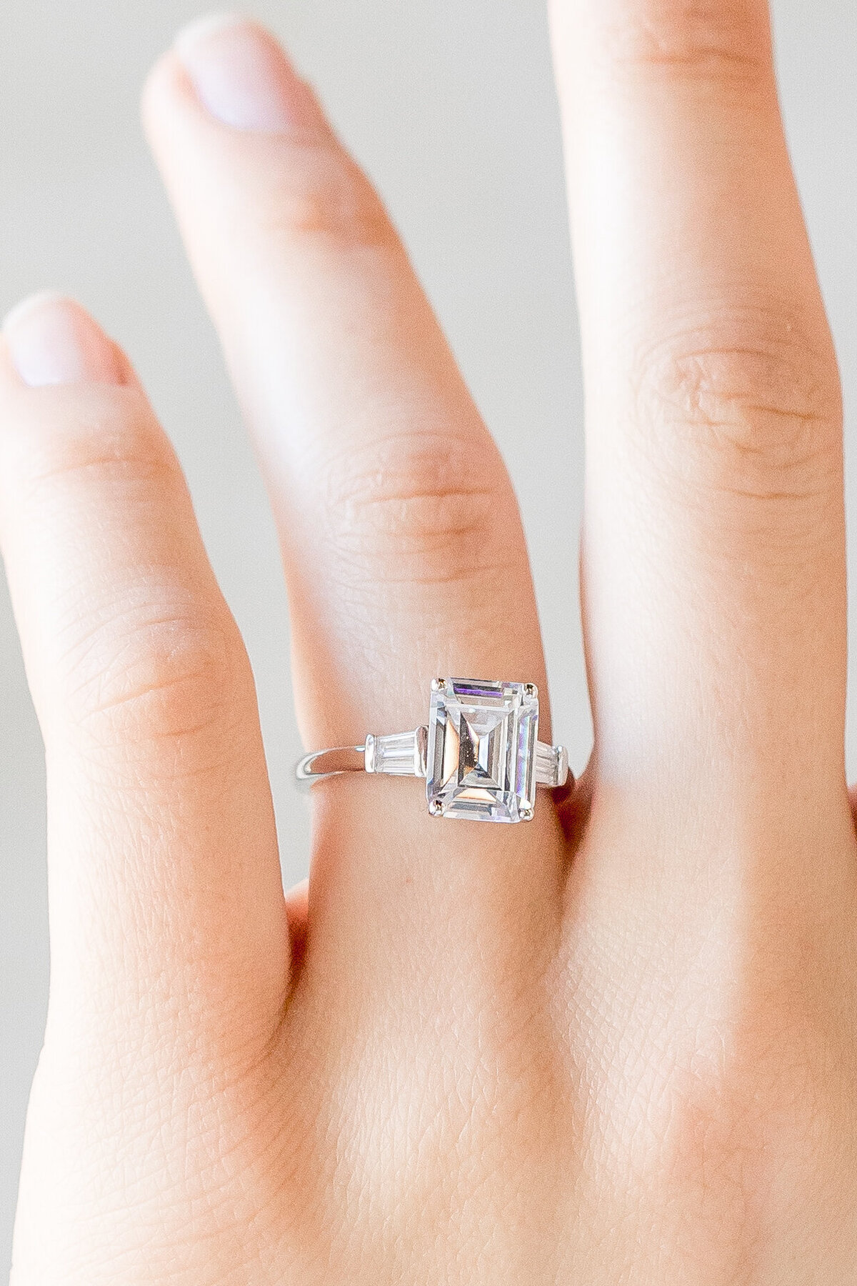 close up of a ring on a woman's finger