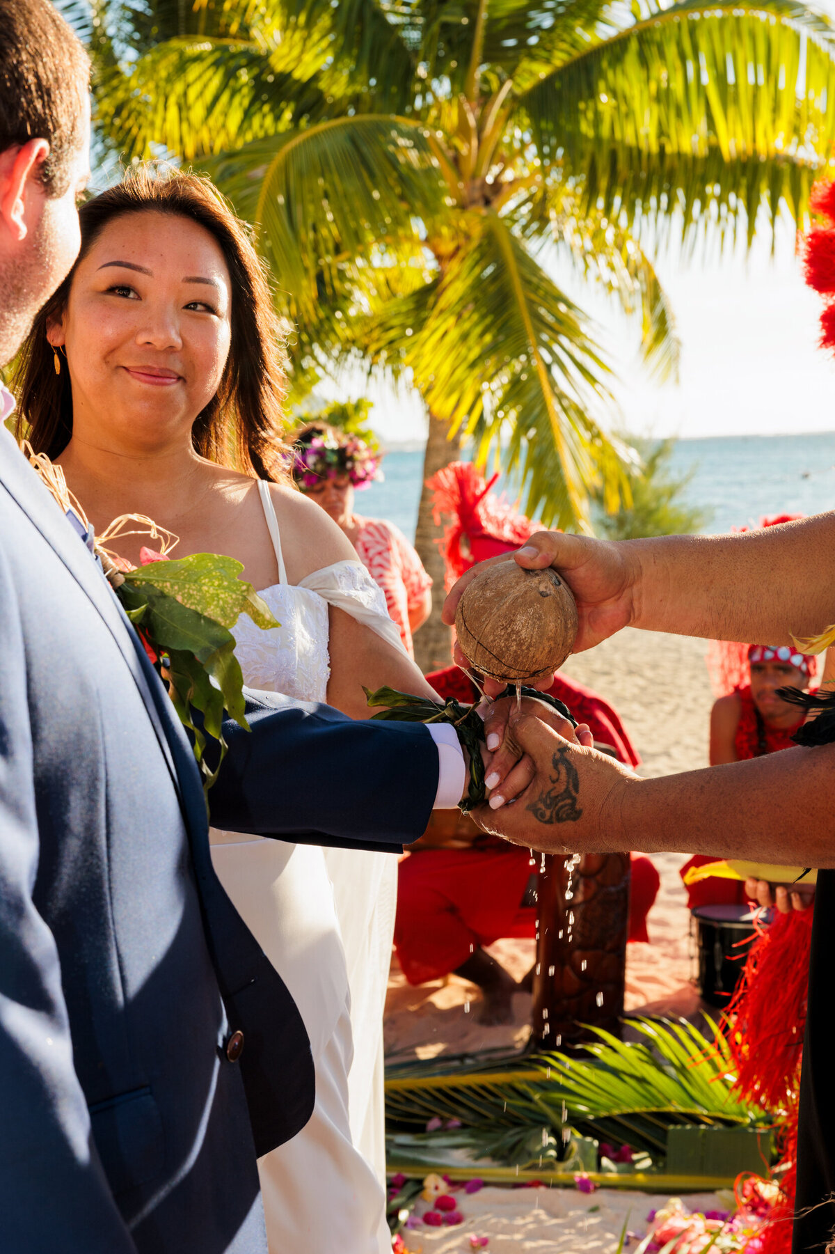 bride-and-groom-blessed-with-coconut-water