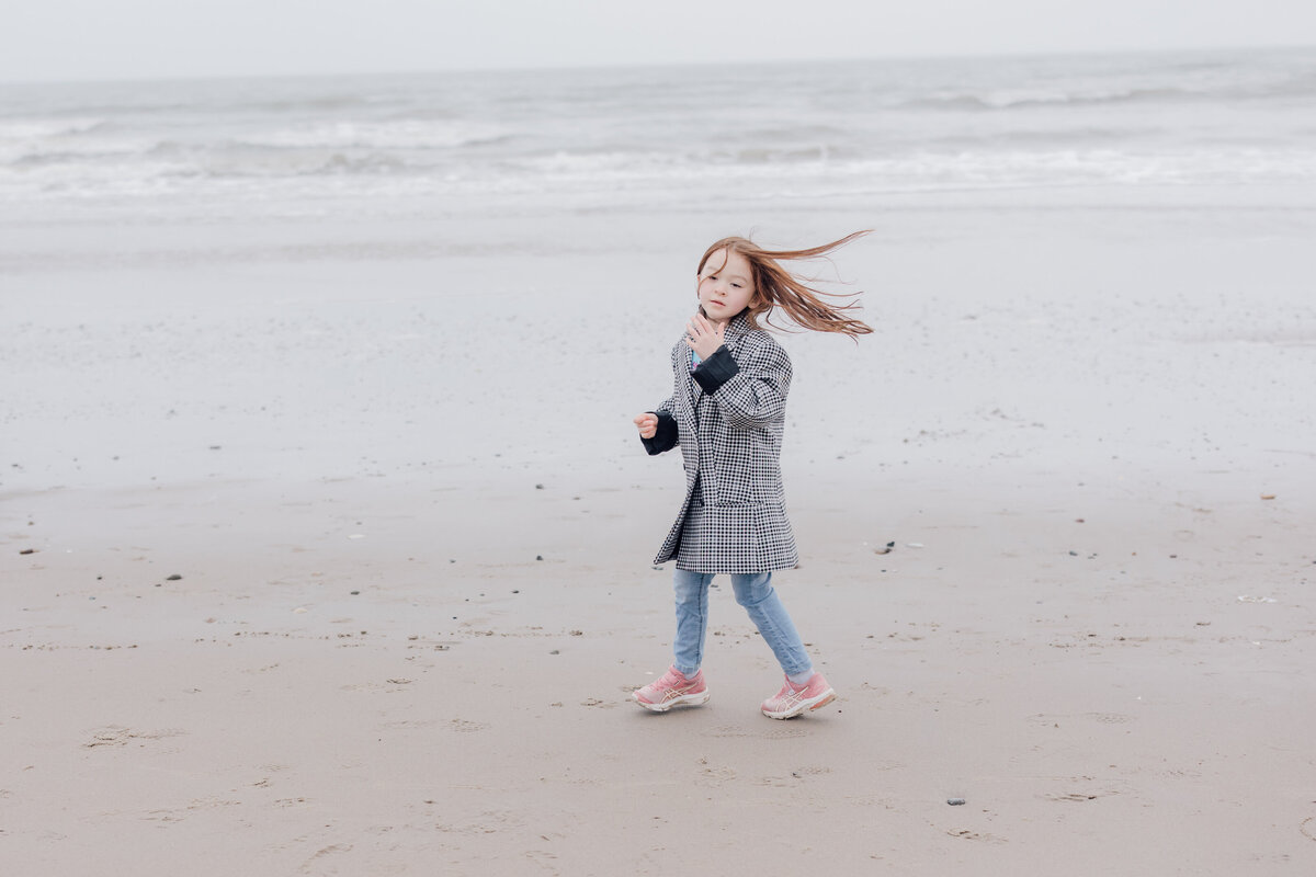 little-girl-running-on-beach