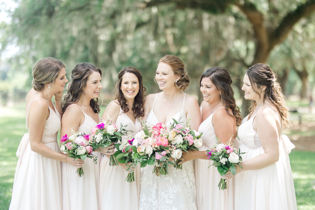 Bridal party laughs together at Charleston venue by Karen Schanely