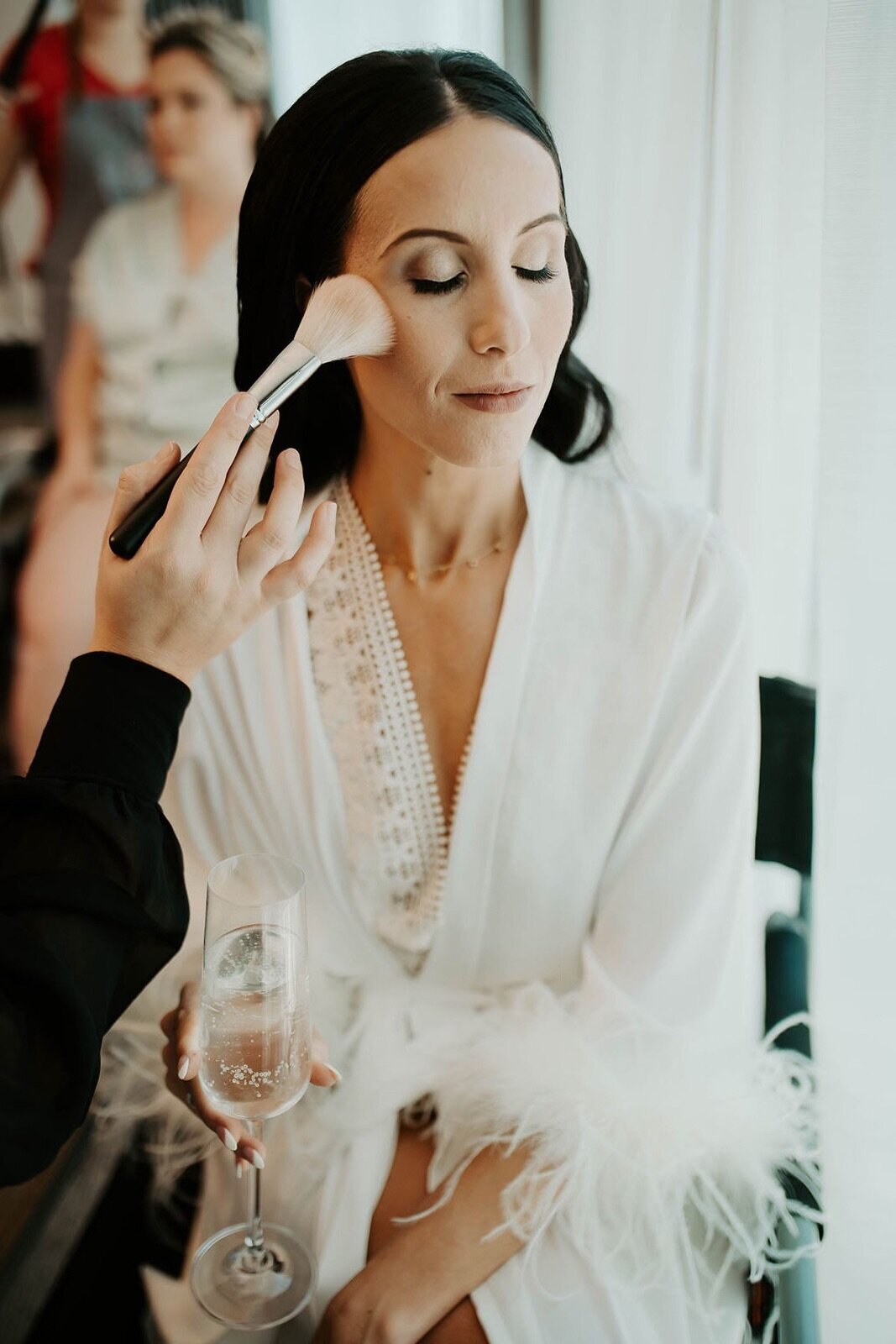 bride-getting-makeup-ready
