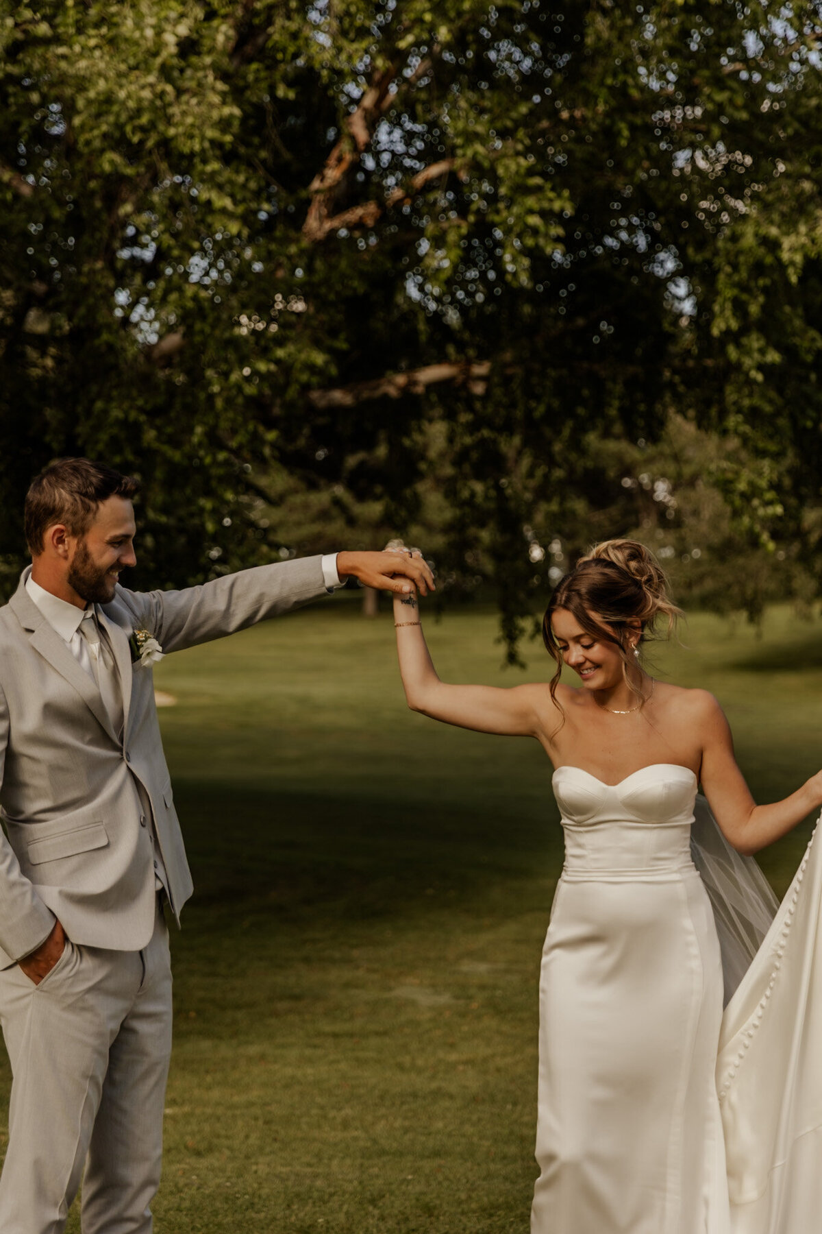 Groom Spinning Bride in MN 