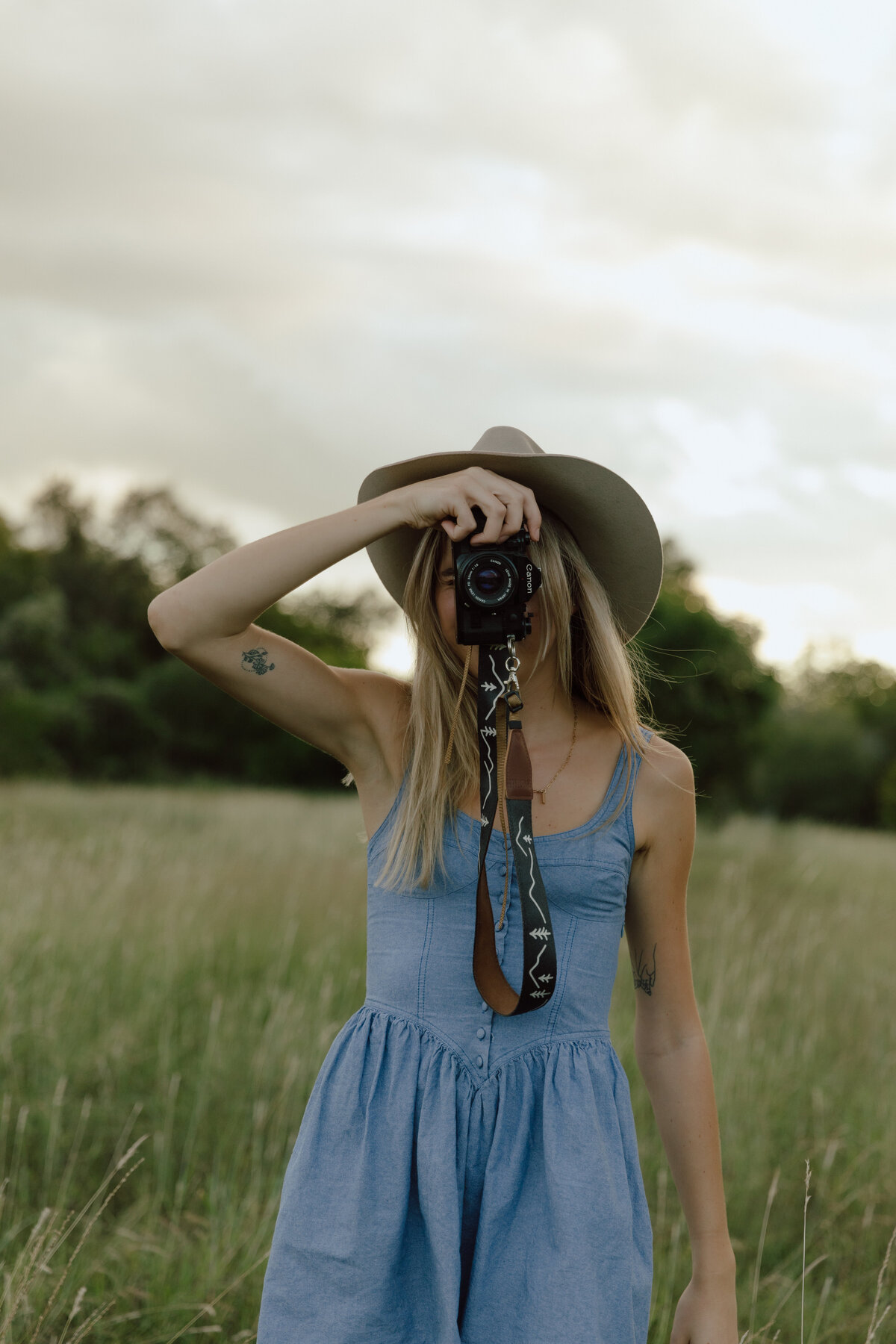 Photos by Tia is a wedding, elopement, engagement, and creative session photographer based in Austin, Texas. She offers both digital and film photography services.