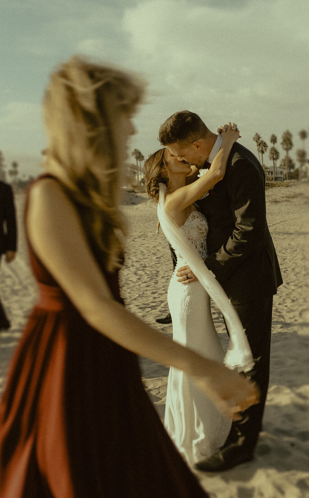 Thuy Tran Photos captured Amanda and Matt's wedding at Coronado beach in San Diego. 