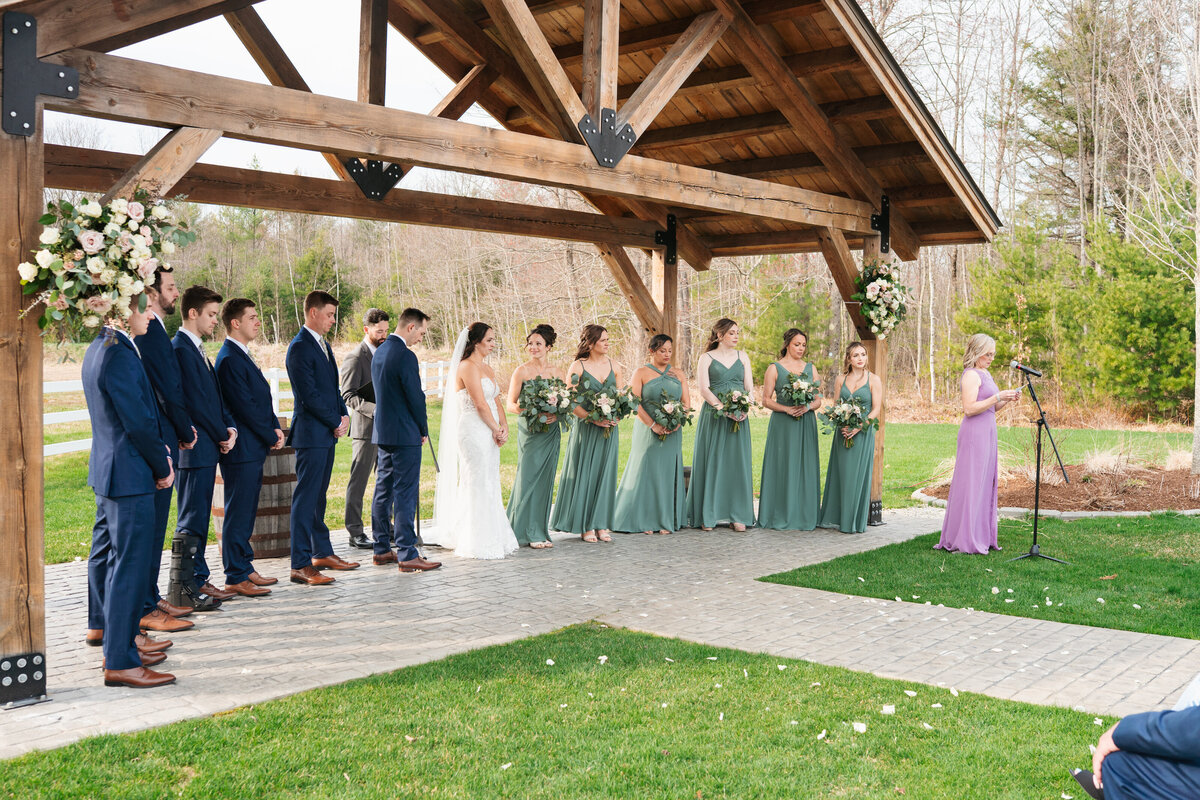 Extended family gathered for group wedding photos


