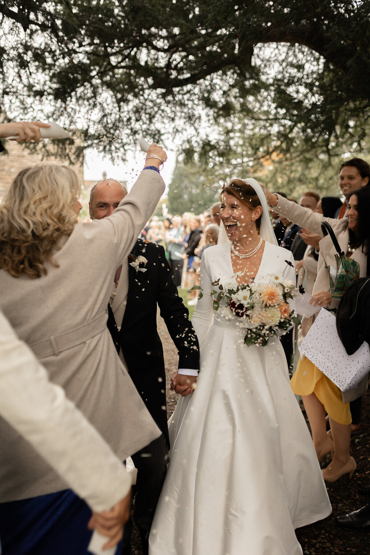 Confetti tunnel at Kin House wedding in Wiltshire