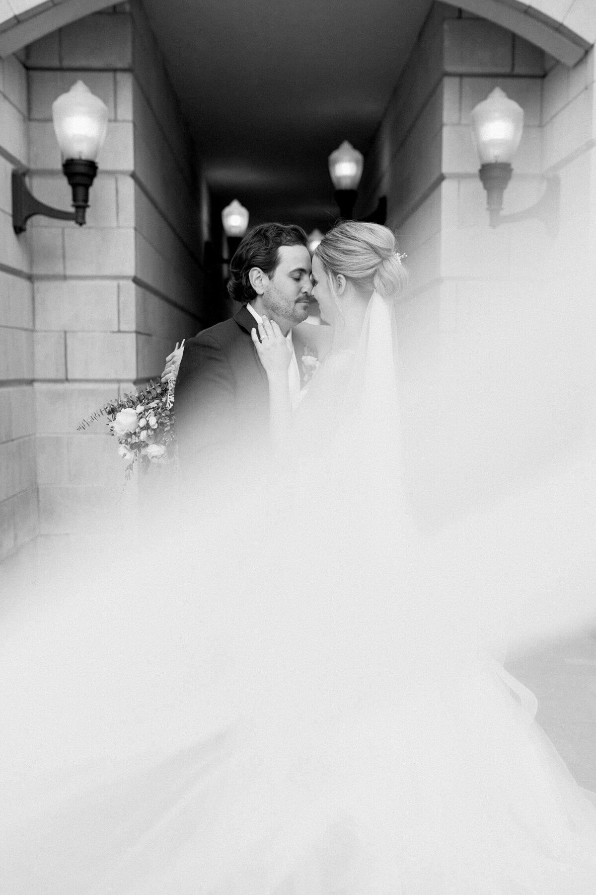 bride and groom looking at each other