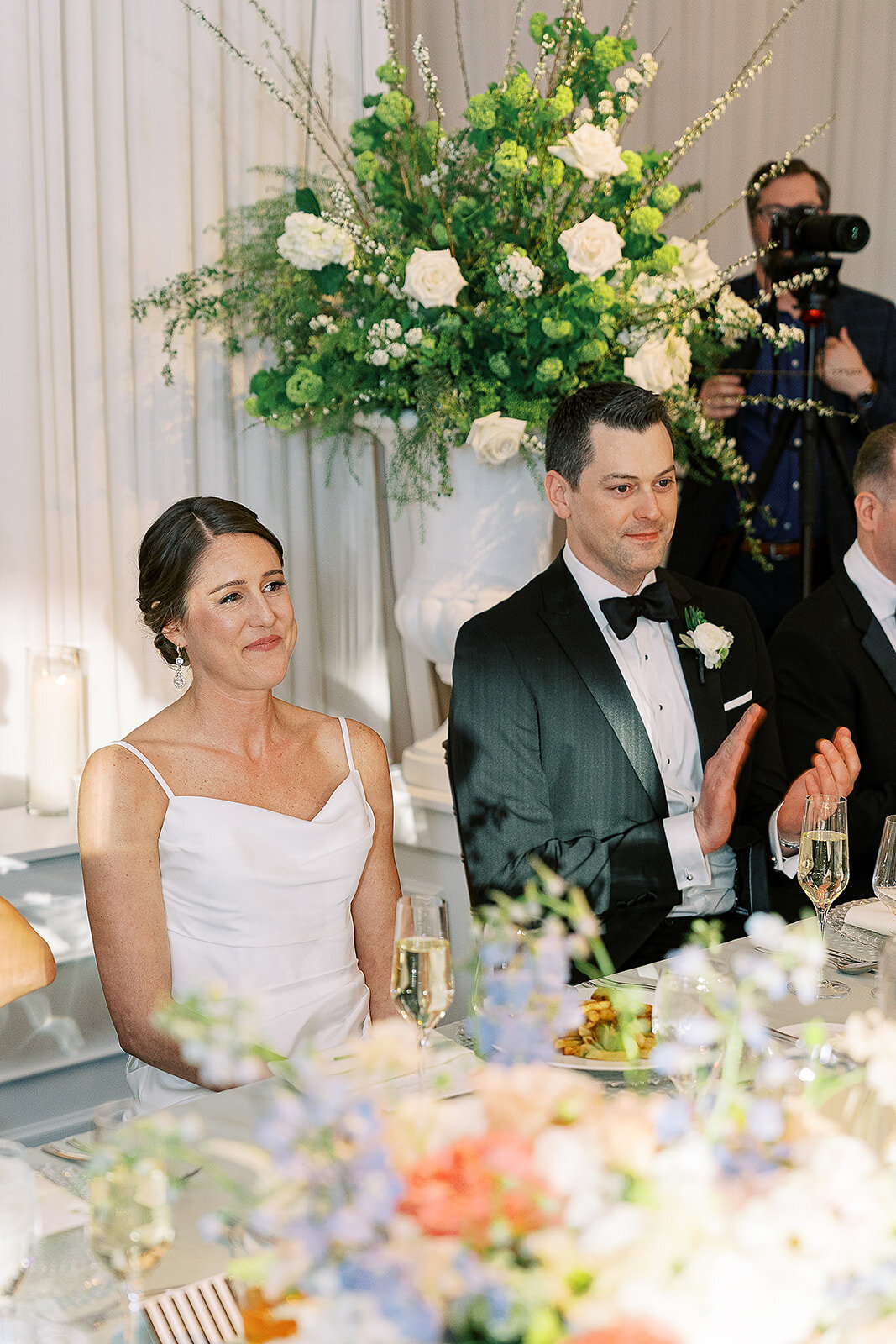 newlyweds-listening-to-toasts-london-house-hotel-chicago-hbicweddings