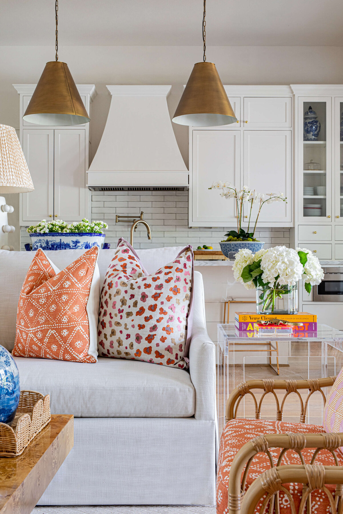 oyster creek studios aryns home orange and gray seating in living room