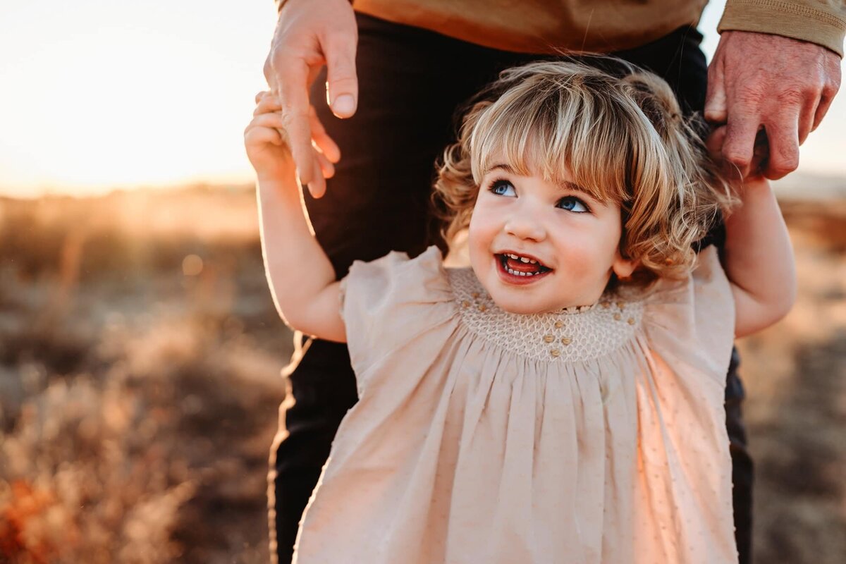 San Diego Family Photographer captures little girl smiling during outdoor family photos