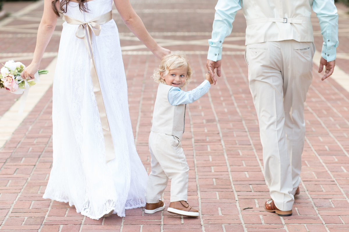 family strolls the promenade after elopement