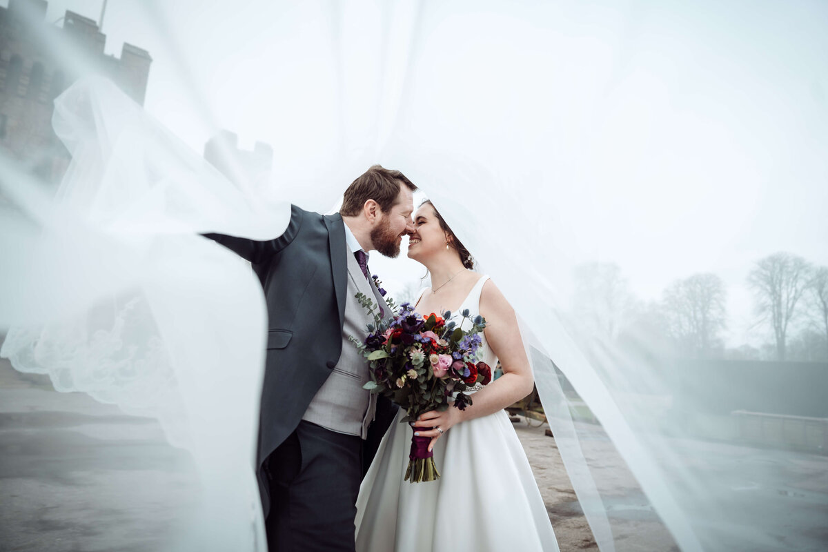 under-the-veil-hever-castle-wedding-couple