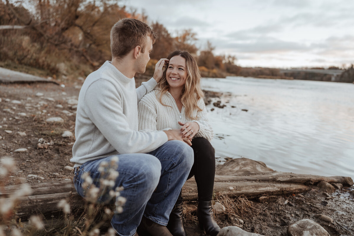 Couple sitting by the river