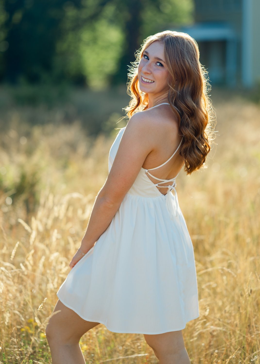 senior girl at discovery park tall grass