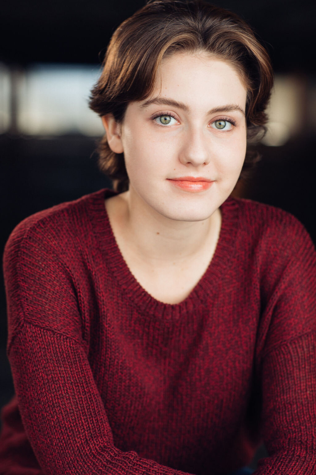 Headshot Photograph Of Young Woman In Maroon Long Sleeves Los Angeles