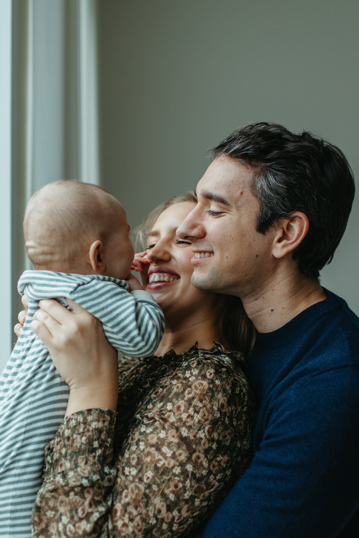 snuggling_baby_at_home
