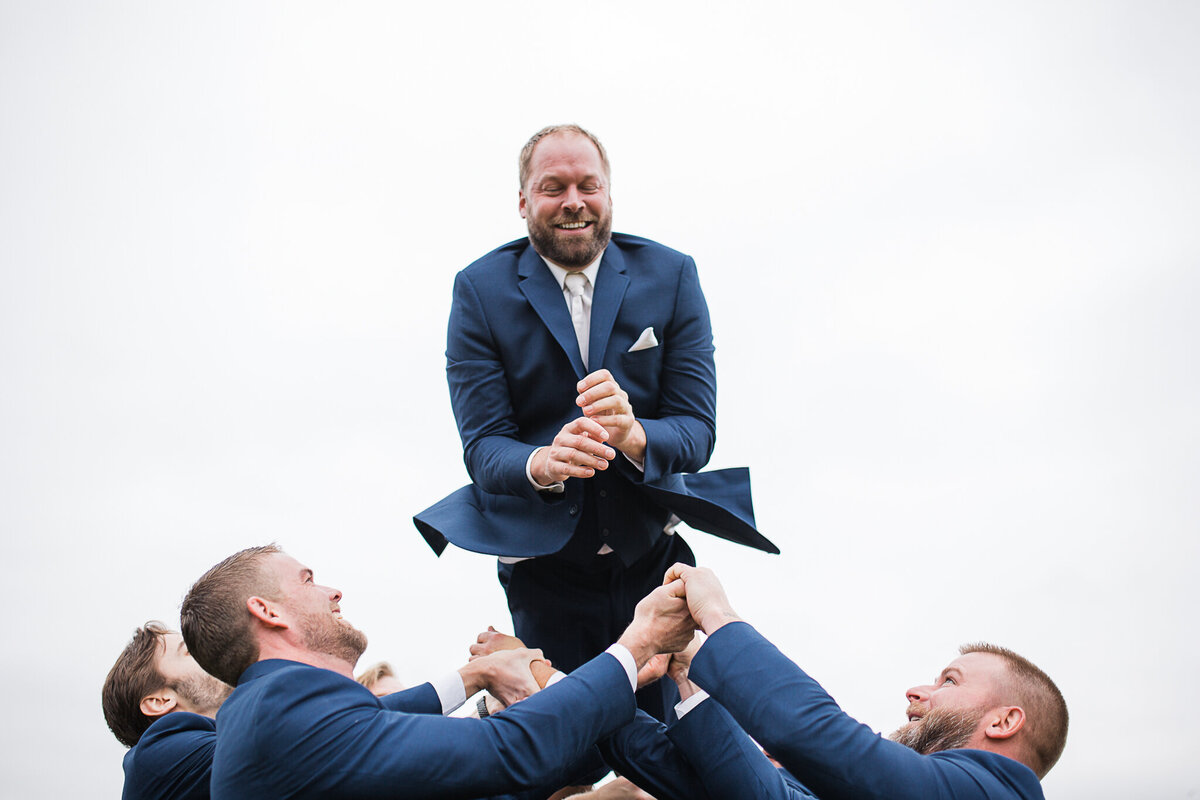 chicago-wedding-groom-toss-groomsmen