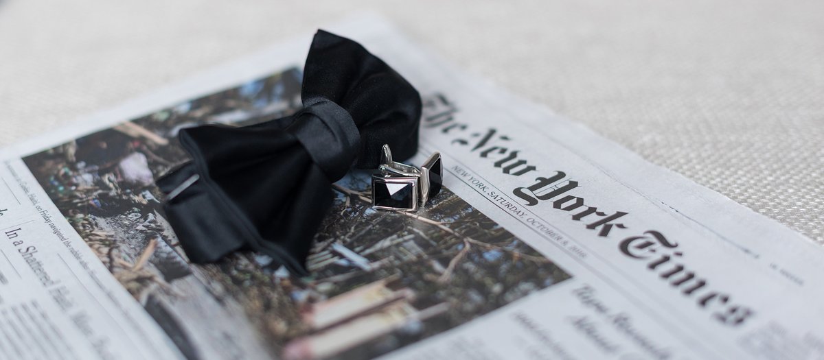 Groom's bowtie and cufflinks on The New York Times photo