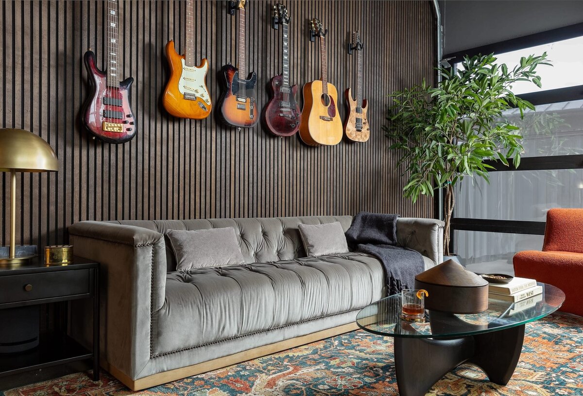 rebekah nicole interiors arbor garage room with accent rug and wood slatted wall