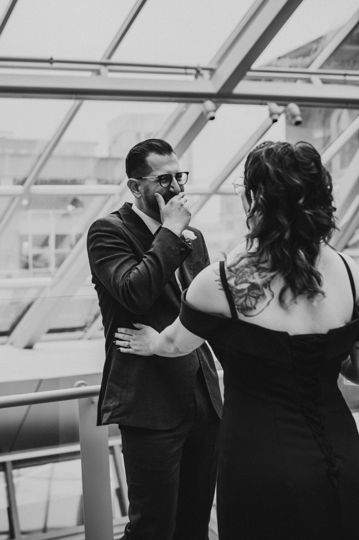 Groom reacts to seeing Bride in her untraditional dress at Akron Art Museum