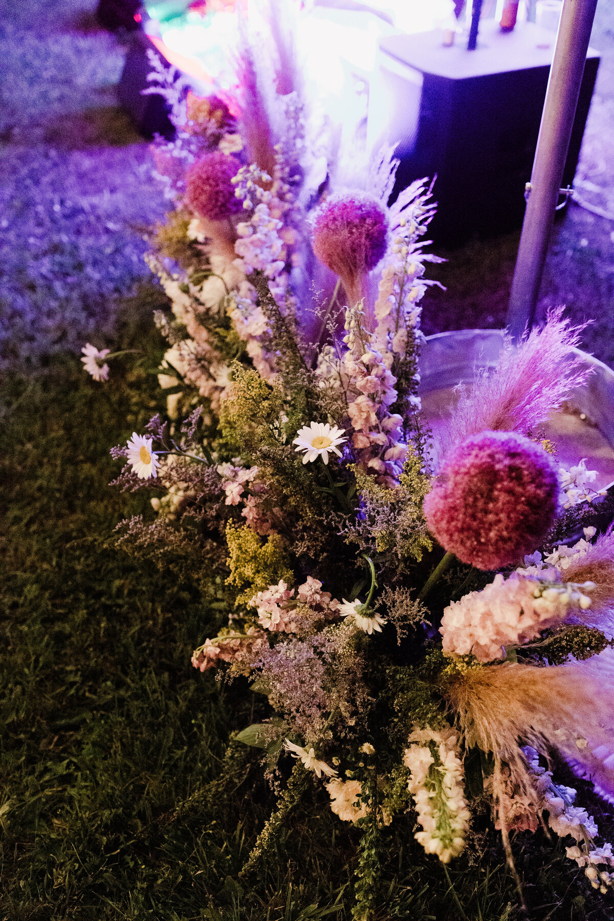Floral arrangement on the ground at Dallenbach Ranch Wedding in Colorado