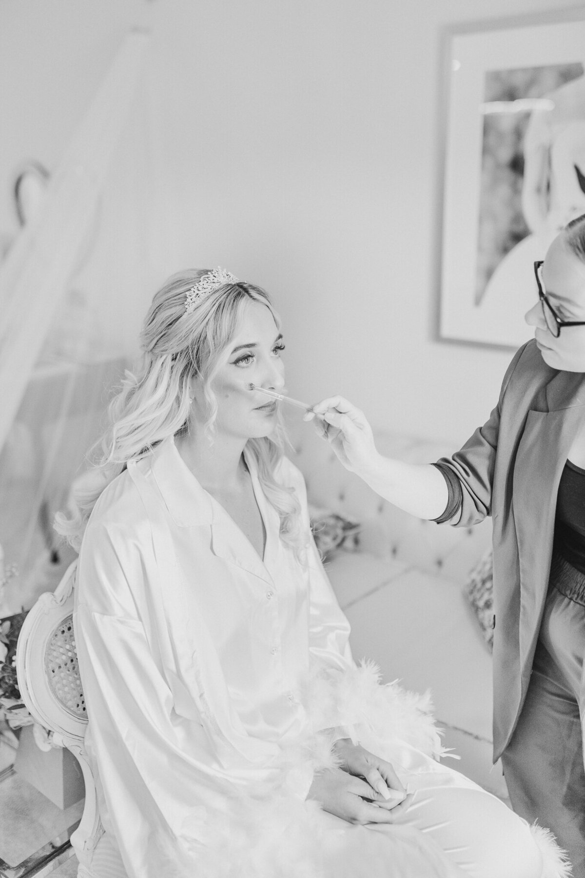 Bride getting make up done at Merrydale Manor Cheshire wedding