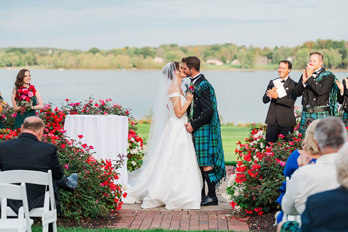 first kiss on wedding day at the lake club of ohio wedding