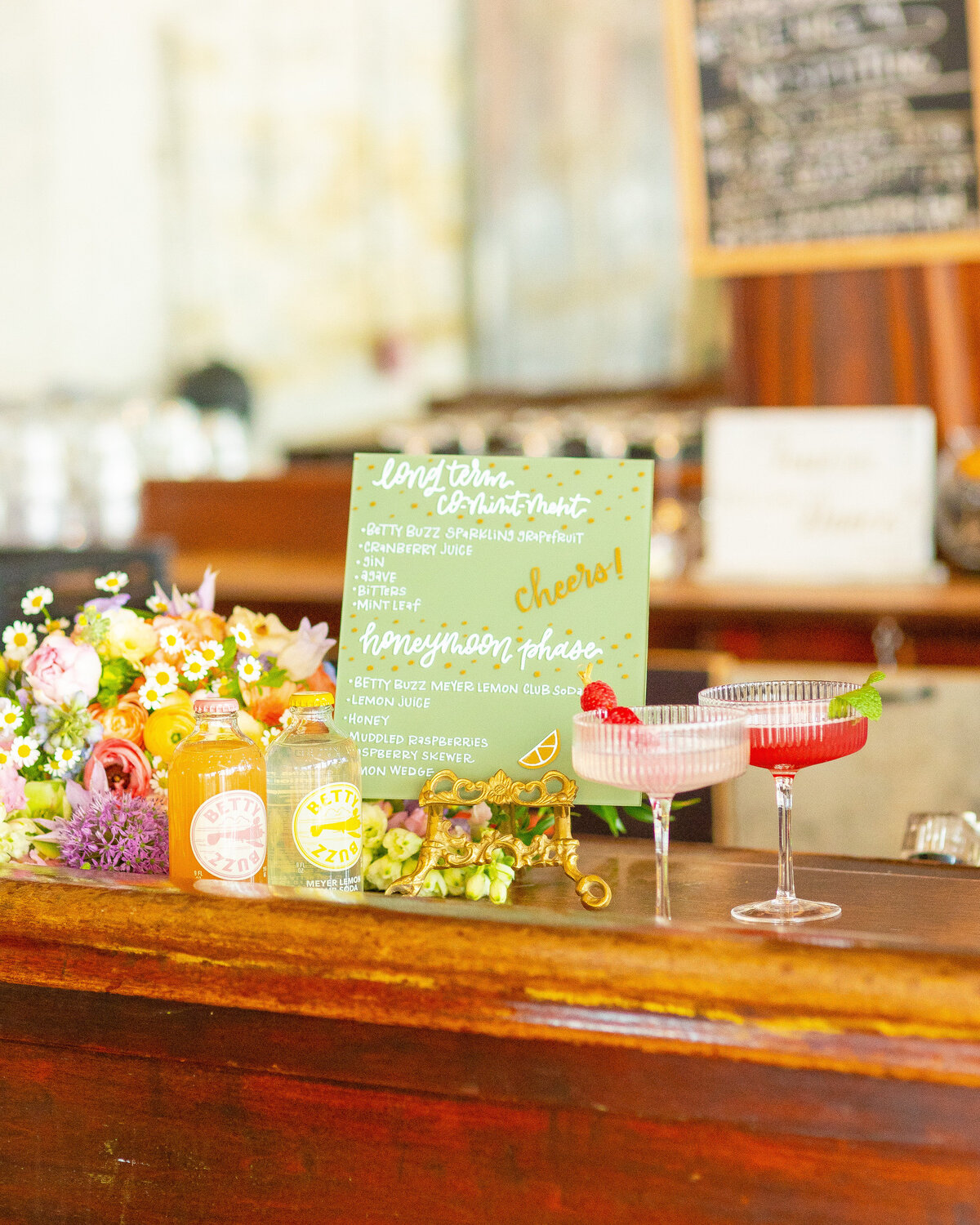 Wedding bar close up with floral arrangements