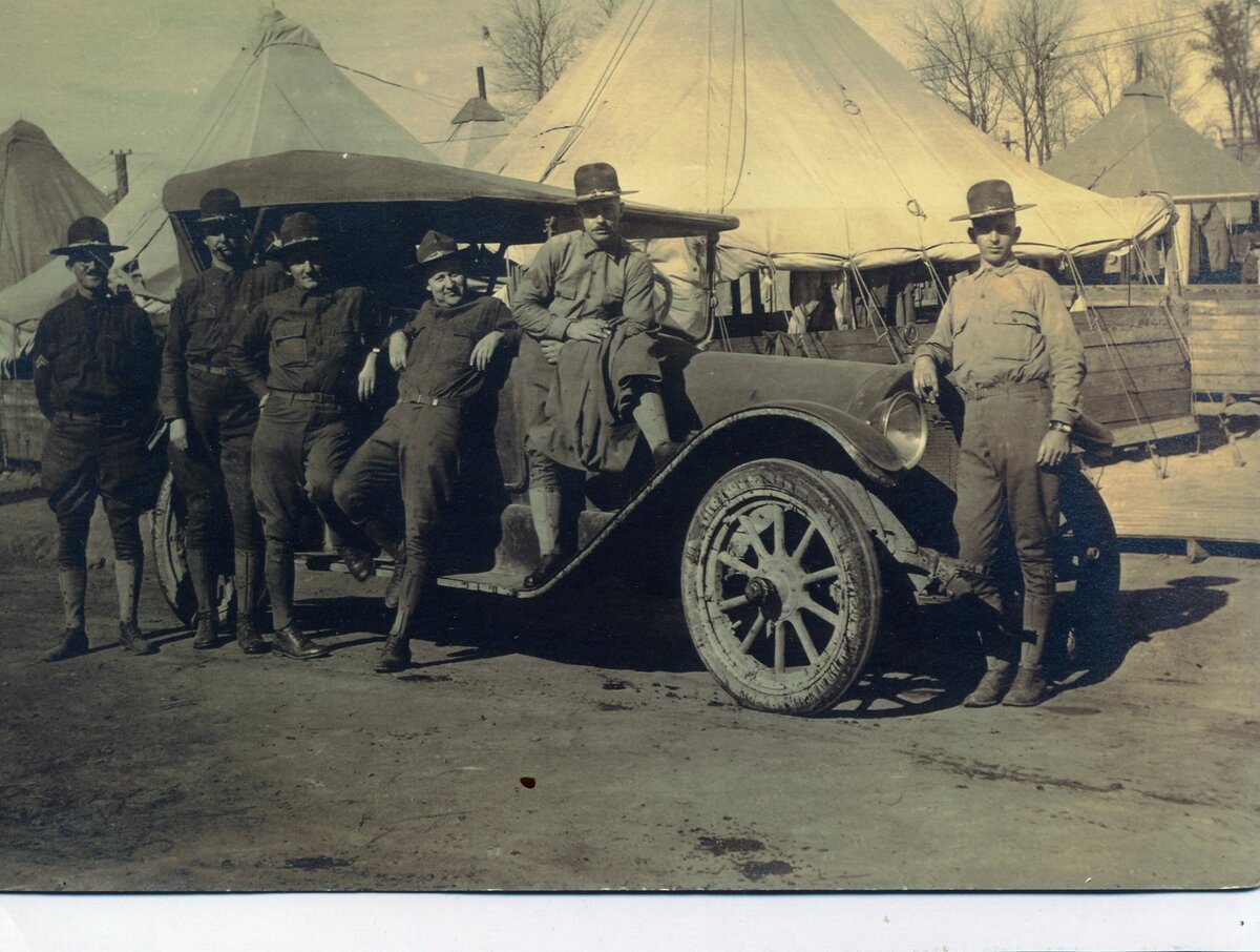 10. Sgt. Wirt Harlin & Gus Comer posing with their car.