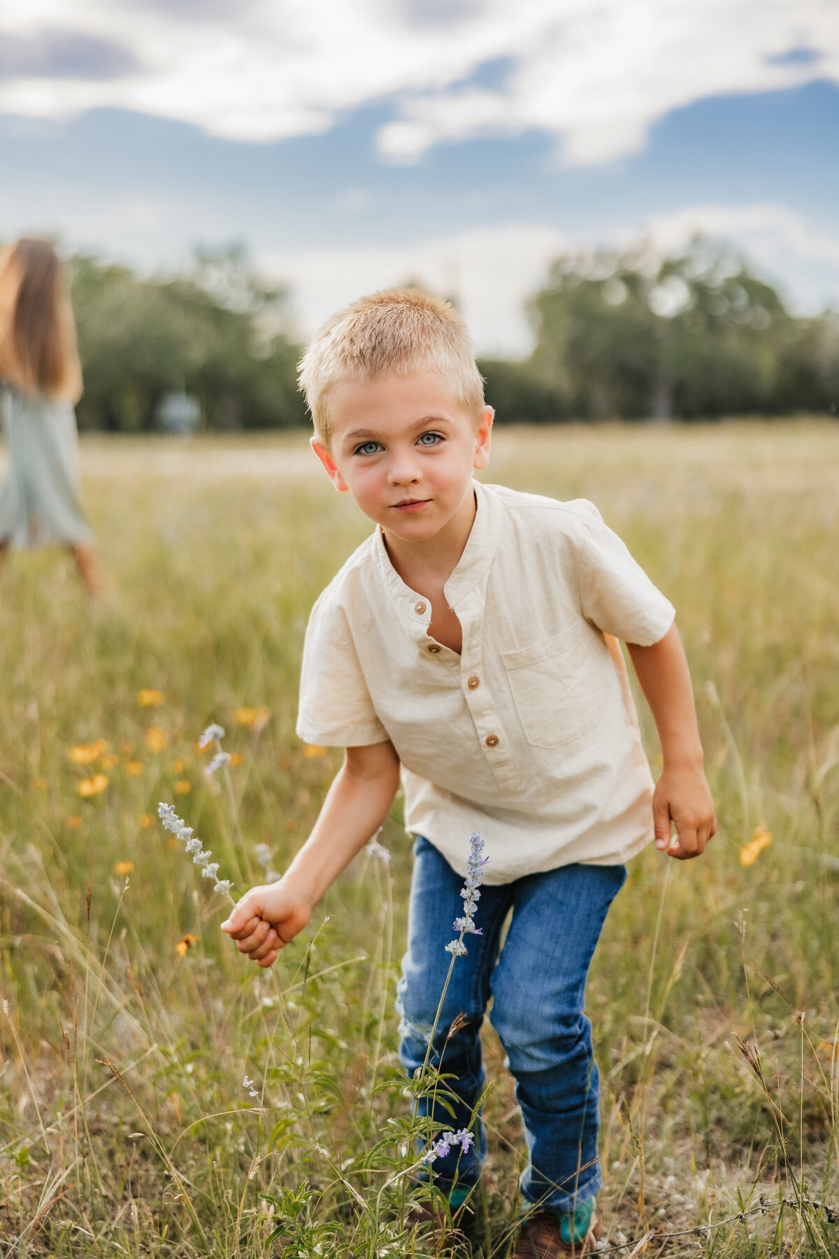 boy-picks-wildflowers
